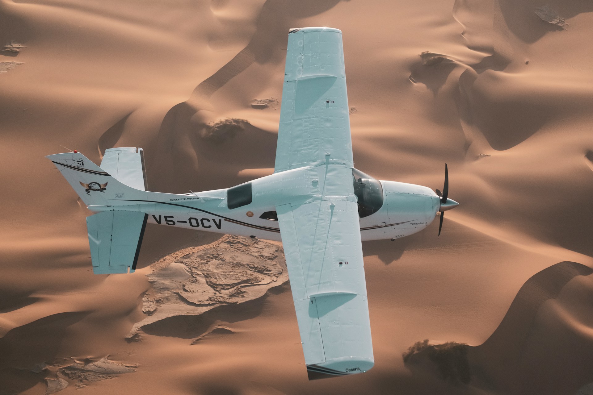 Fly-in safari — light aircraft over Uganda wilderness