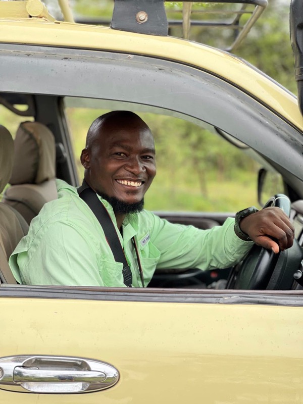 City Tyson Magezi, founder of Quaint Africa Safaris, in safari guide attire